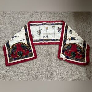 long Irish scarf featuring a design inspired by the Book of Kells